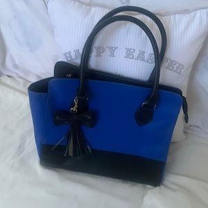 Royle blue bag , black on the bottom with a black bow